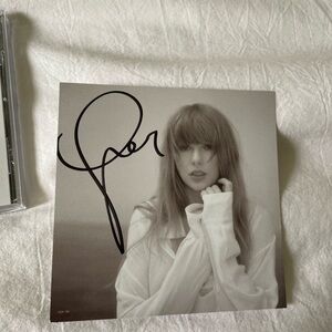 signed the tortured poets department cd